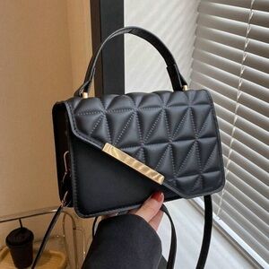 Elegant Black Quilted Handbag